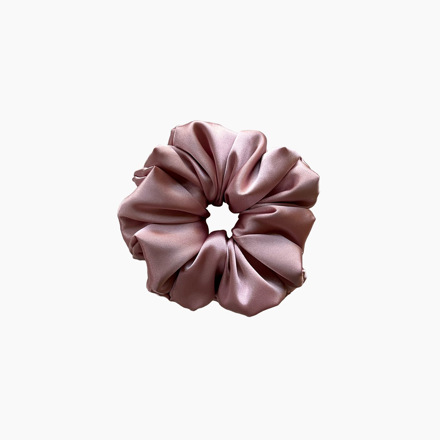 Pink satin scrunchies from Nude collection in large size, displayed on a white background.