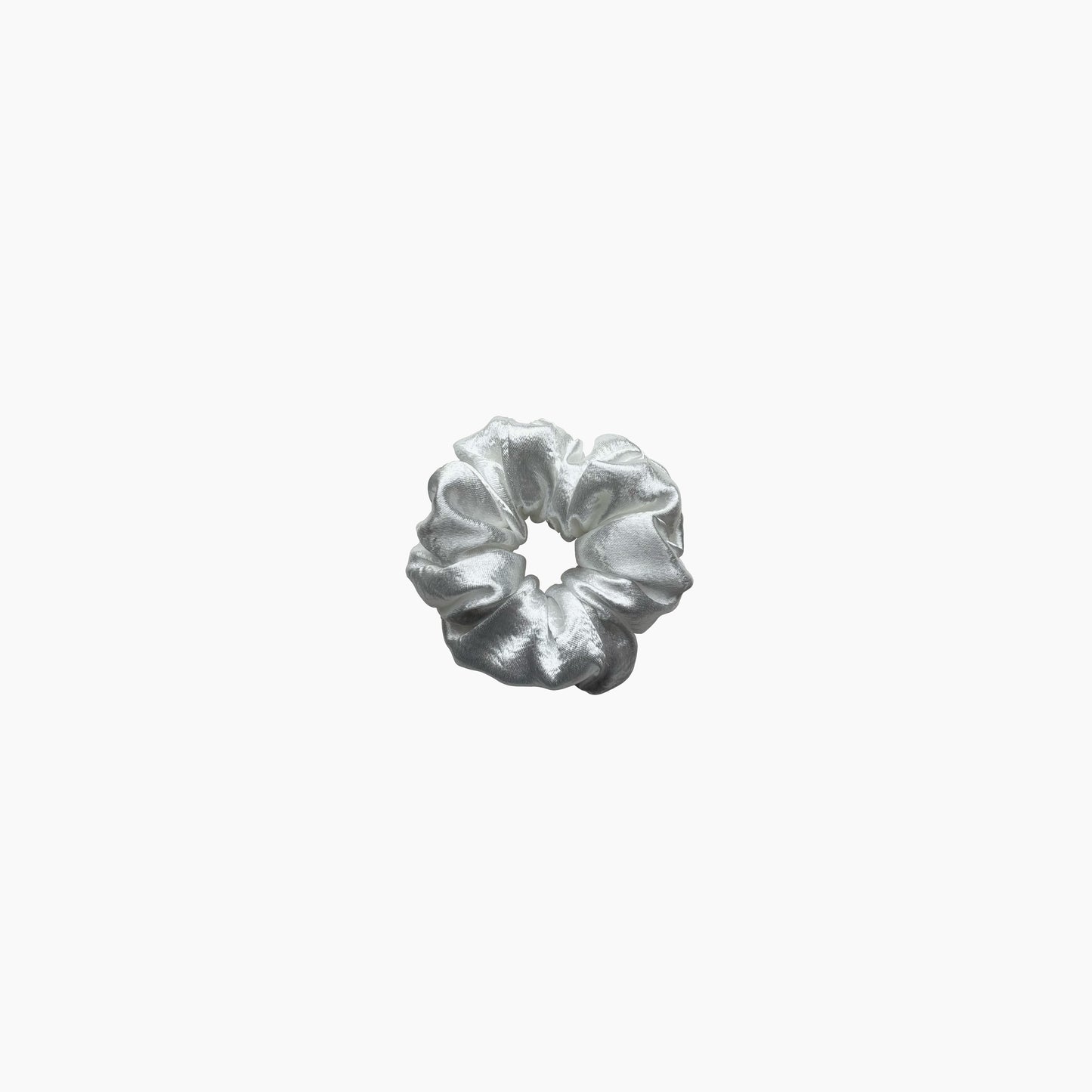White satin scrunchie from Pebble Satin collection in medium size, displayed on a white background.