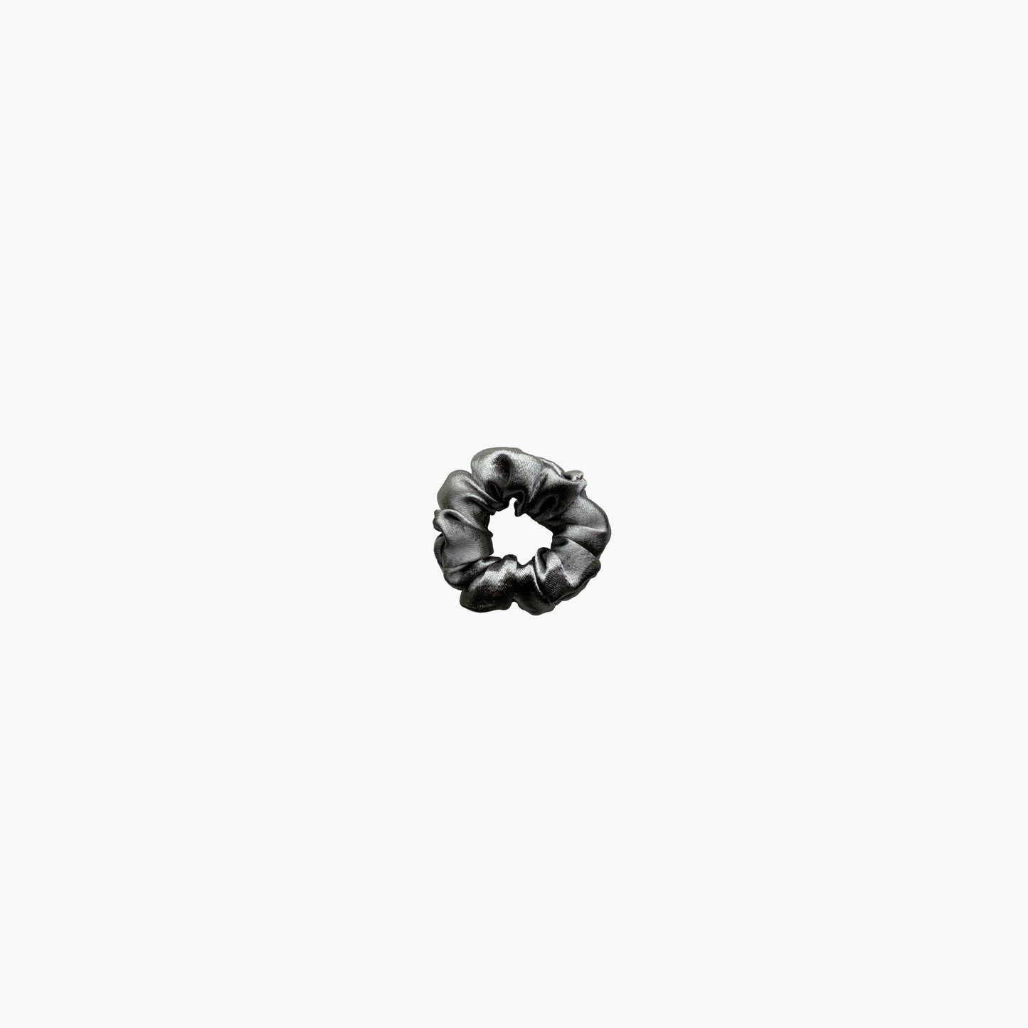 Silver satin scrunchie from Pebble Satin collection in small size, displayed on a white background.