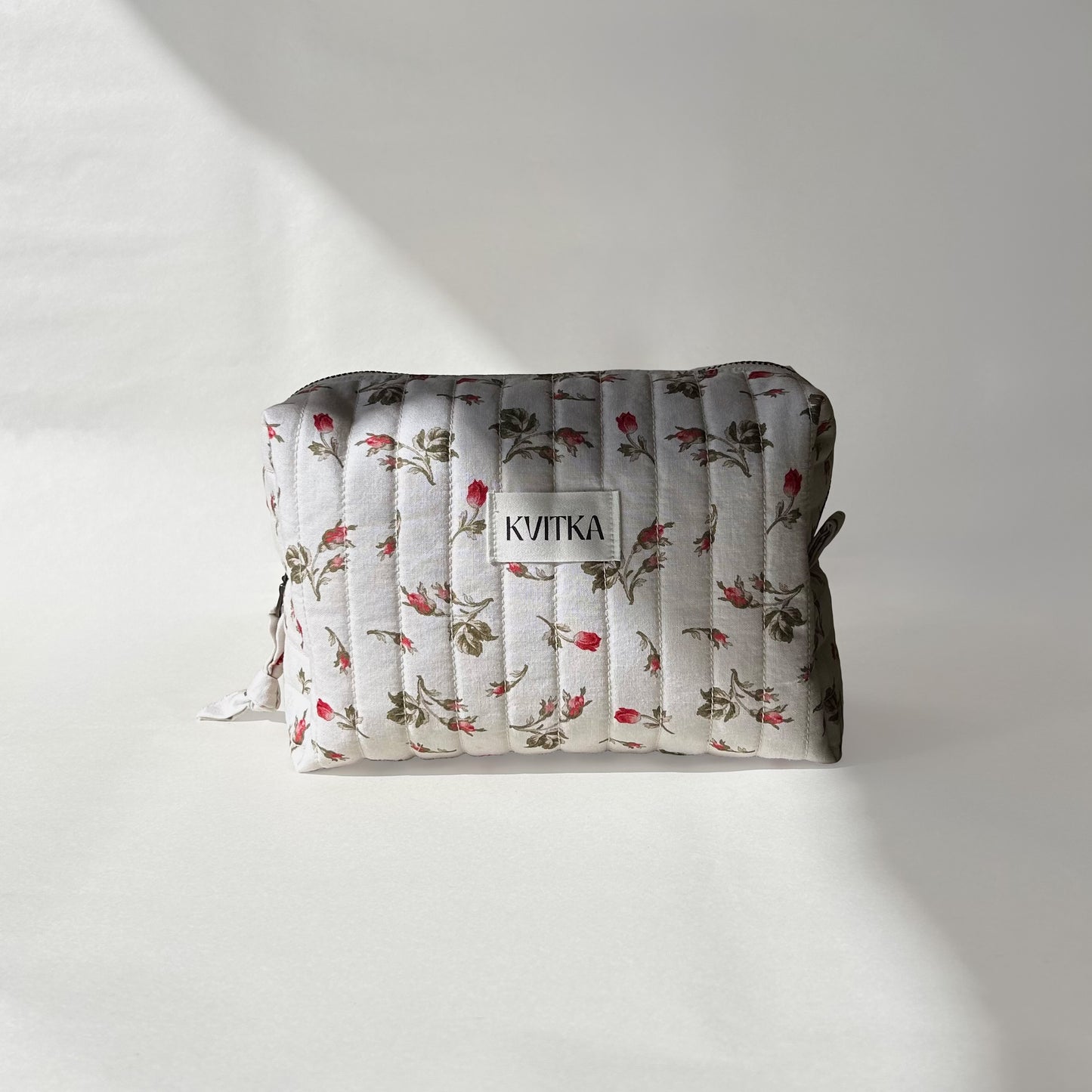 Medium-size of quilted makeup bag from the Bell Pivoines collection, displayed front-on with a visible KVITKA label on a soft white background.