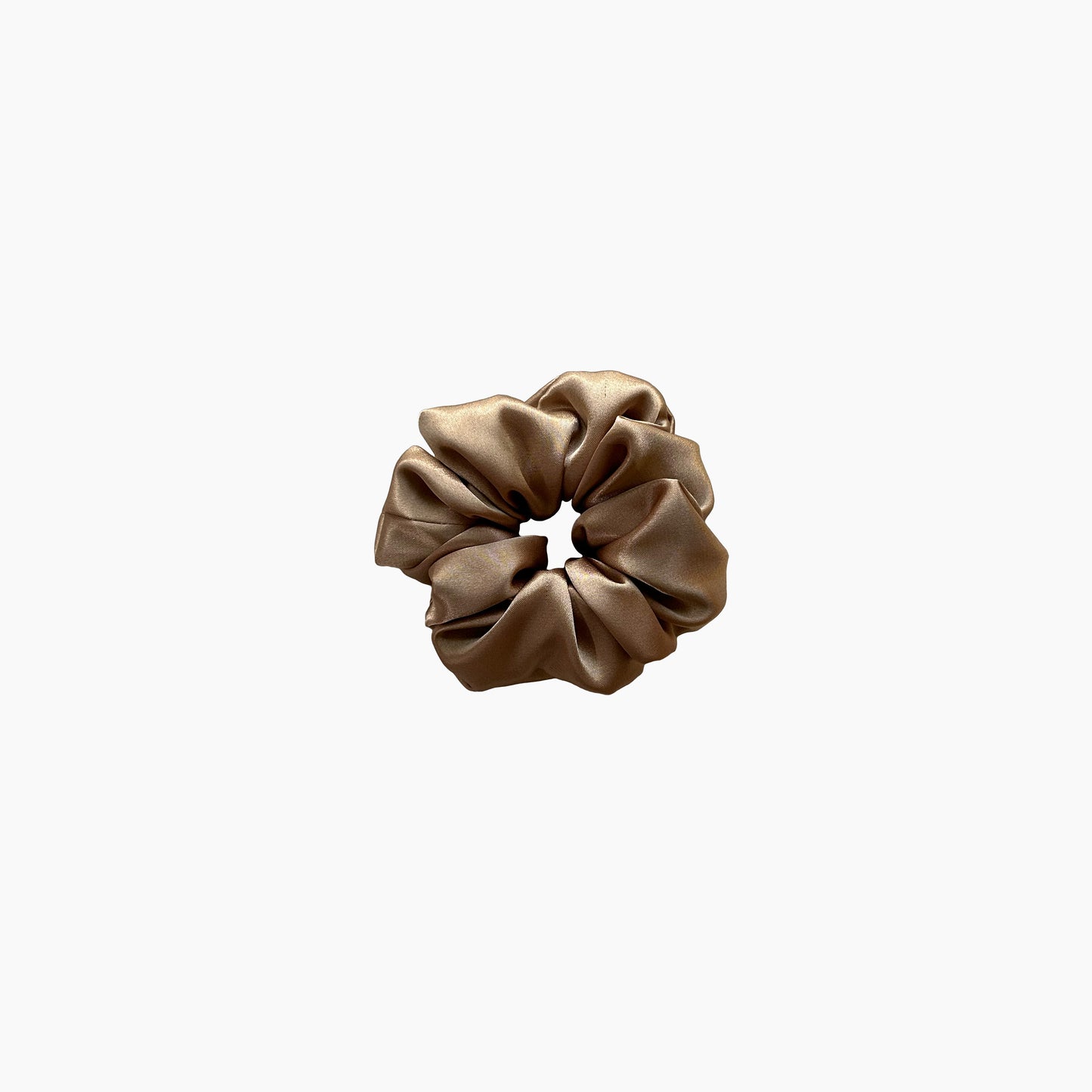 Gold satin scrunchie from Nude collection in medium size, displayed on a white background.