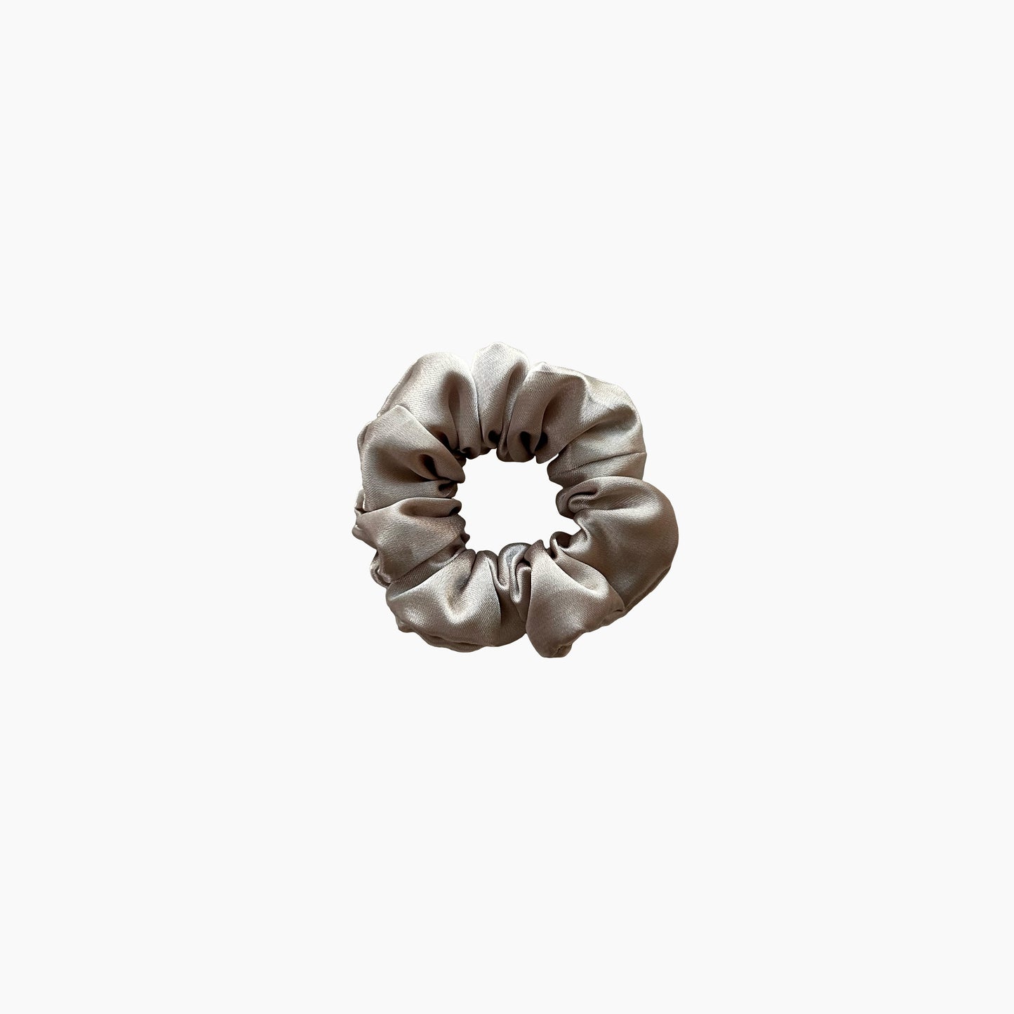 Beige satin scrunchie from Nude collection in small size, displayed on a white background.
